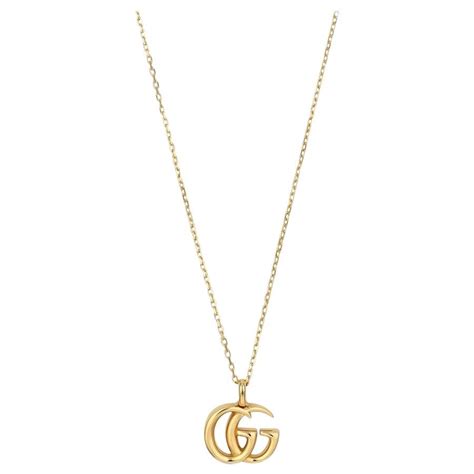 pendenti gucci doppia g in oro giallo con quattro brillanti|Collana Double G con cristalli in Oro .